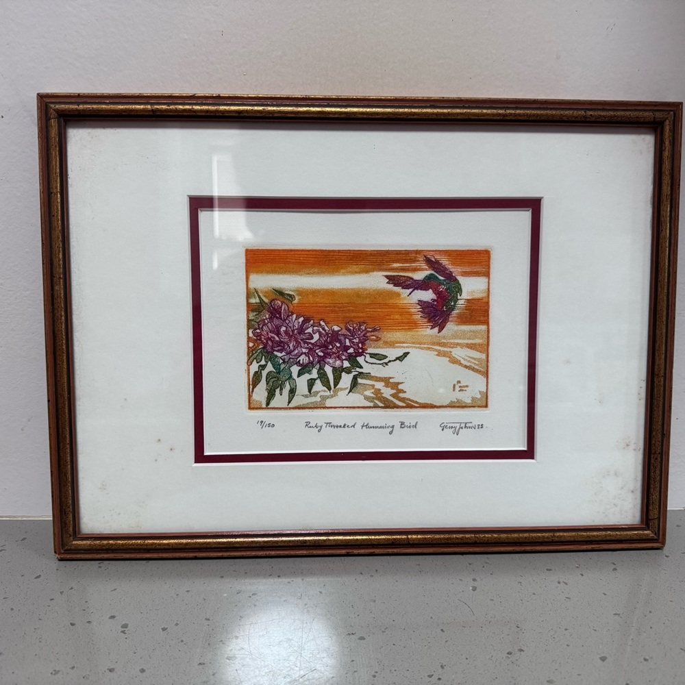 “Ruby Throated Humming Bird" by the artist Gerry Johnson.